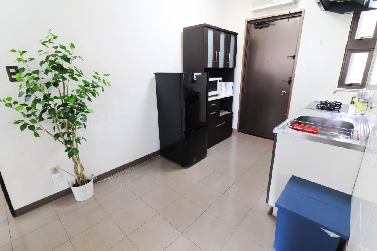 Condominium Hotel Mihama Upi Тятан Номер фото